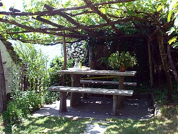 Ferienhaus in Minusio - Pergola-Essplatz