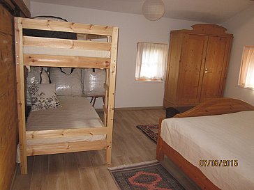 Ferienhaus in Stierva - Doppelzimmer mit Kaiütenbett