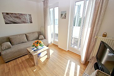 Ferienwohnung in Göhren - Wohnzimmer mit Sofaecke