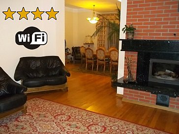 Ferienhaus in Gdansk-Rotmanka - Wohnzimmer mit Kamin