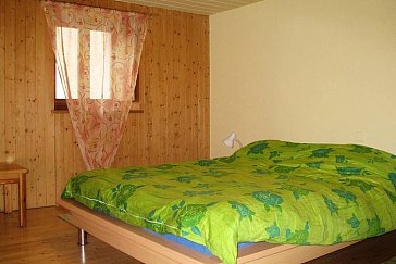 Ferienhaus in Dangio-Torre - Schlafzimmer mit Doppelbett