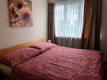 Ferienwohnung in Rapperswil - Schlafzimmer mit Doppelbett