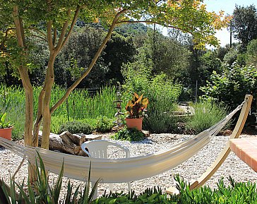 Ferienhaus in Campiglia Marittima - Hängematte im Kräutergarten