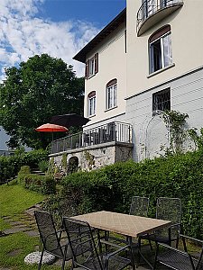 Ferienhaus in Caslano - Gartensitzplatz