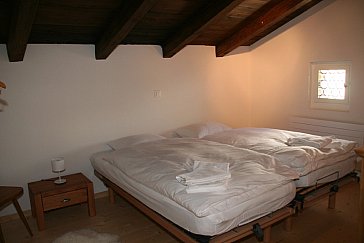 Ferienwohnung in Klosters - Schlafzimmer 1