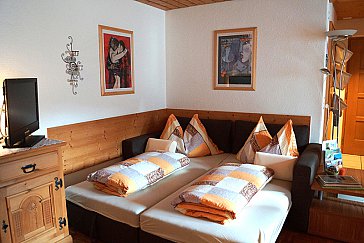 Ferienwohnung in Scuol - Wohnraum mit Schlafsofa