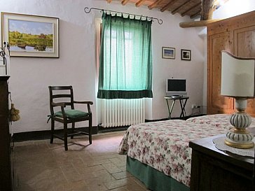 Ferienhaus in Pienza - Schlafzimmer mit TV-Gerät