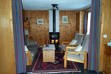 Ferienhaus in Amden-Arvenbühl - Wohnzimmer mit Schwedenofen