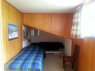 Ferienwohnung in Grindelwald - Schlafzimmer mit Dachschräge