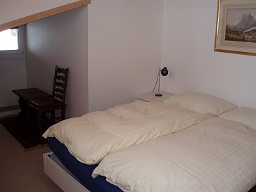 Ferienwohnung in Grindelwald - Schlafzimmer mit Dachschräge