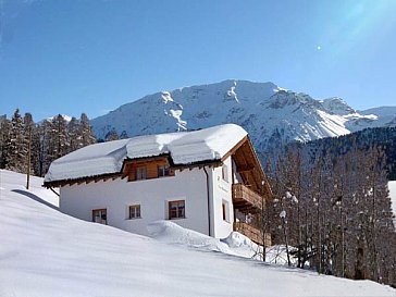 Ferienwohnung in Lü - Chasa Randulina im Winter