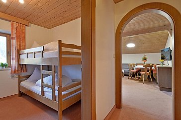 Ferienwohnung in Alpbach - Schlafzimmer mit Stockbetten