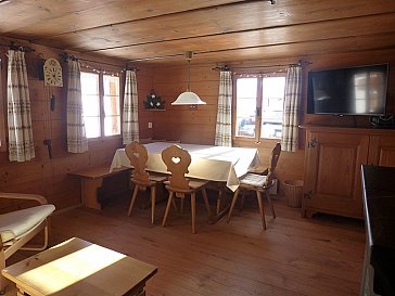 Ferienhaus in Lenzerheide - Wohnzimmer Esstisch
