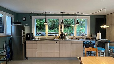 Ferienwohnung in Kandersteg - Wohnzimmer mit Küchenzeile