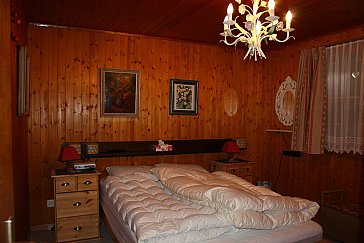 Ferienwohnung in Flumserberg-Bergheim - Schlafzimmer mit Doppelbett