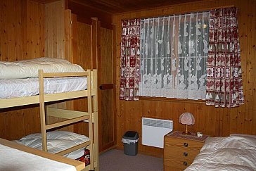 Ferienwohnung in Flumserberg-Bergheim - Schafzimmer mit Etagenbett & Einzelbett