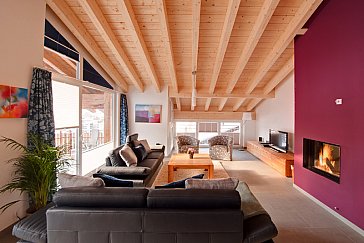 Ferienwohnung in Zermatt - Wohnzimmer mit Kamin