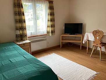 Ferienwohnung in Disentis-Mustér - Stube / Schlafzimmer 2