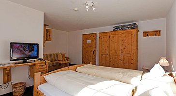 Ferienwohnung in Davos-Sertig - Hotelzimmer Walserhuus