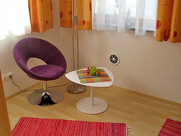 Ferienwohnung in Alpbach - Farbenfrohes Zimmer mit Stockbett