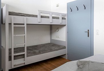 Ferienhaus in Wald im Pinzgau - Blick in die Schlafzimmer