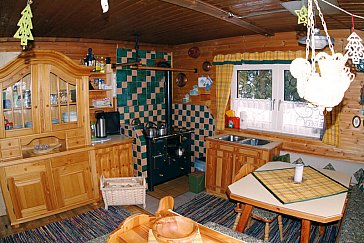 Ferienhaus in Wagrain - Der Holzofen in der Stube
