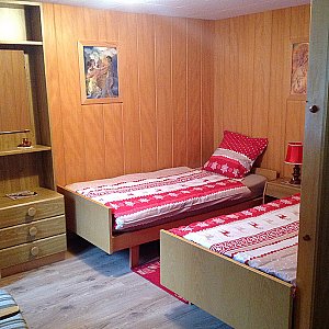 Ferienwohnung in Leukerbad - Schlafraum obere Wohnung