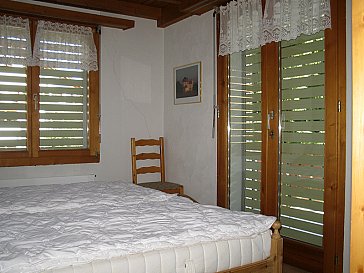 Ferienwohnung in Laax - Schlafzimmer