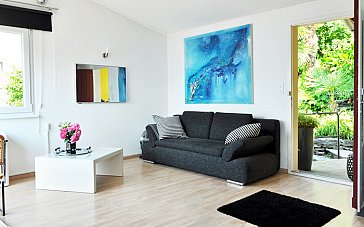 Ferienwohnung in Brione sopra Minusio - Wohnbereich