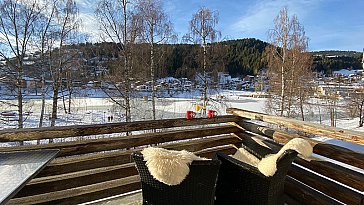 Ferienwohnung in Laax - Balkon mit Aussicht auf den Laaxersee