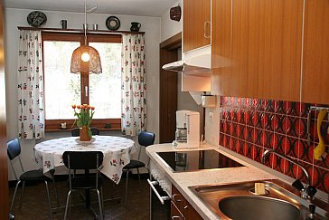 Ferienwohnung in Klosters - Küche mit Esstisch