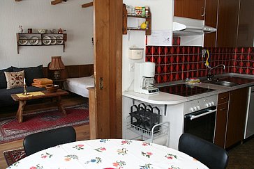 Ferienwohnung in Klosters - Küche mit Esstisch