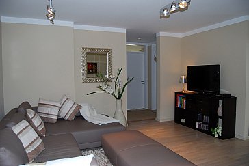 Ferienwohnung in Wenningstedt - Wohnzimmer mit Flatscreen