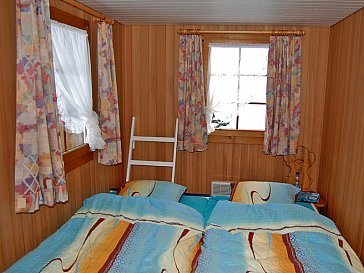Ferienhaus in Riederalp - Doppelbett im Familienzimmer