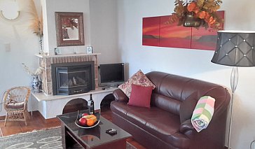 Ferienhaus in Dénia - Wohnzimmer mit Kamin und SAT-TV
