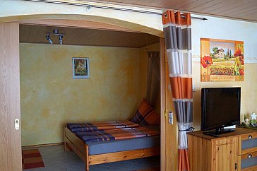 Ferienwohnung in Rust - Doppelbett im Schlafzimmer