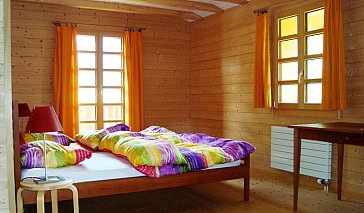 Ferienhaus in Lumbrein - Betten im grossen Schlafzimmer