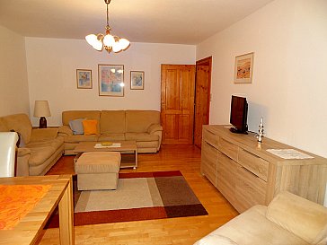 Ferienwohnung in Lofer-St. Martin - Wohnzimmer mit Wohnlandschaft und Essberich