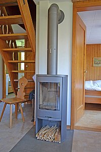 Ferienhaus in Adelboden - Schwedenofen im Wohnraum