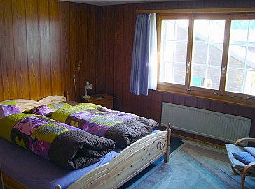 Ferienhaus in Lumbrein - Elternschlafzimmer mit Doppelbett OG