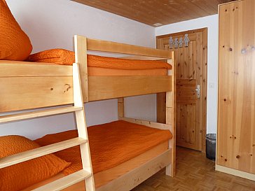 Ferienwohnung in Cresta-Avers - Schlafzimmer mit 2 Stockbetten