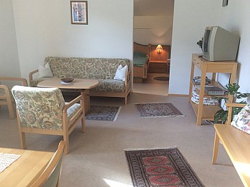 Ferienwohnung in St. Ulrich am Pillersee - Blick vom Wohnzimmer ins Schlafzimmer