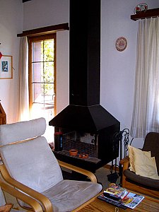 Ferienhaus in Sankt Stephan - Wohnbereich mit Kamin