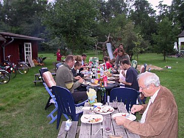 Ferienhaus in Rechlin - Gemeinsames Grillen im Garten