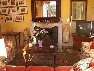 Ferienhaus in Livorno - Wohnzimmer mit Kamin