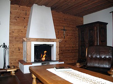 Ferienhaus in Hirschegg - Wohnzimmer mit Kamin