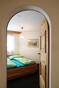 Ferienwohnung in St. Moritz - Schlafzimmer Eltern