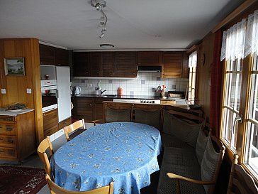 Ferienwohnung in Adelboden - Wohnzimmer mit Küche