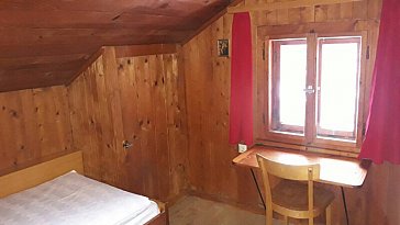 Ferienhaus in Bürserberg - Rotes Schlafzimmer