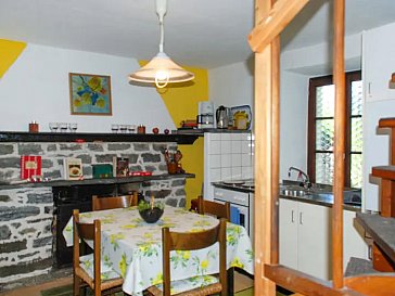 Ferienwohnung in Gordola - Wohnküche mit Kamin